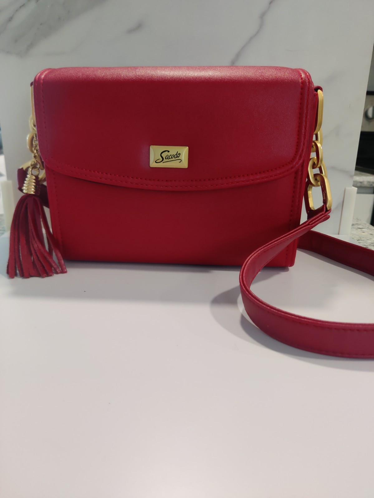 Sacodo Red Purse With Tassel And Gold Embellishments