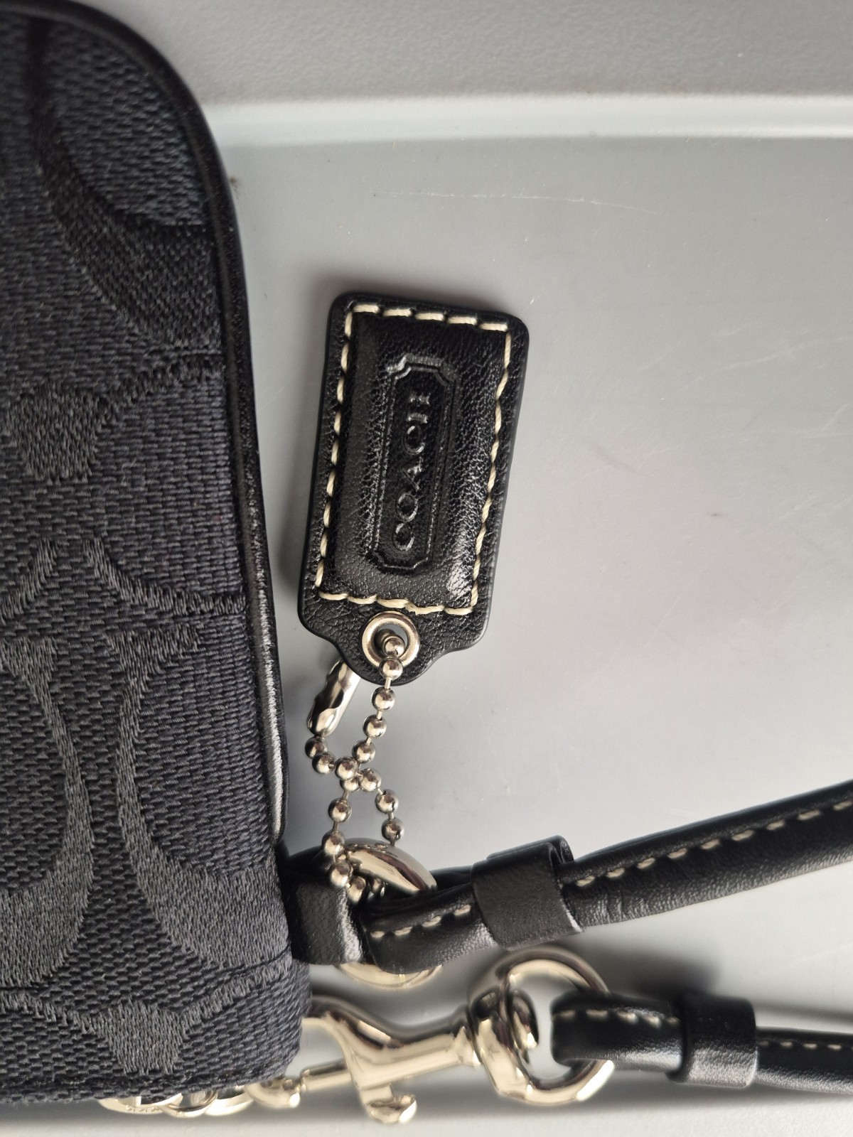Brand new black/gray signature coach wristlet