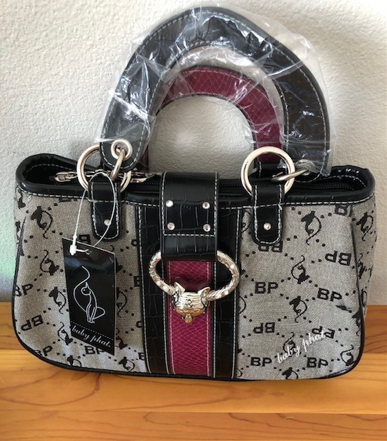 Vintage Authentic Baby Phat Bag never been used with original tag.