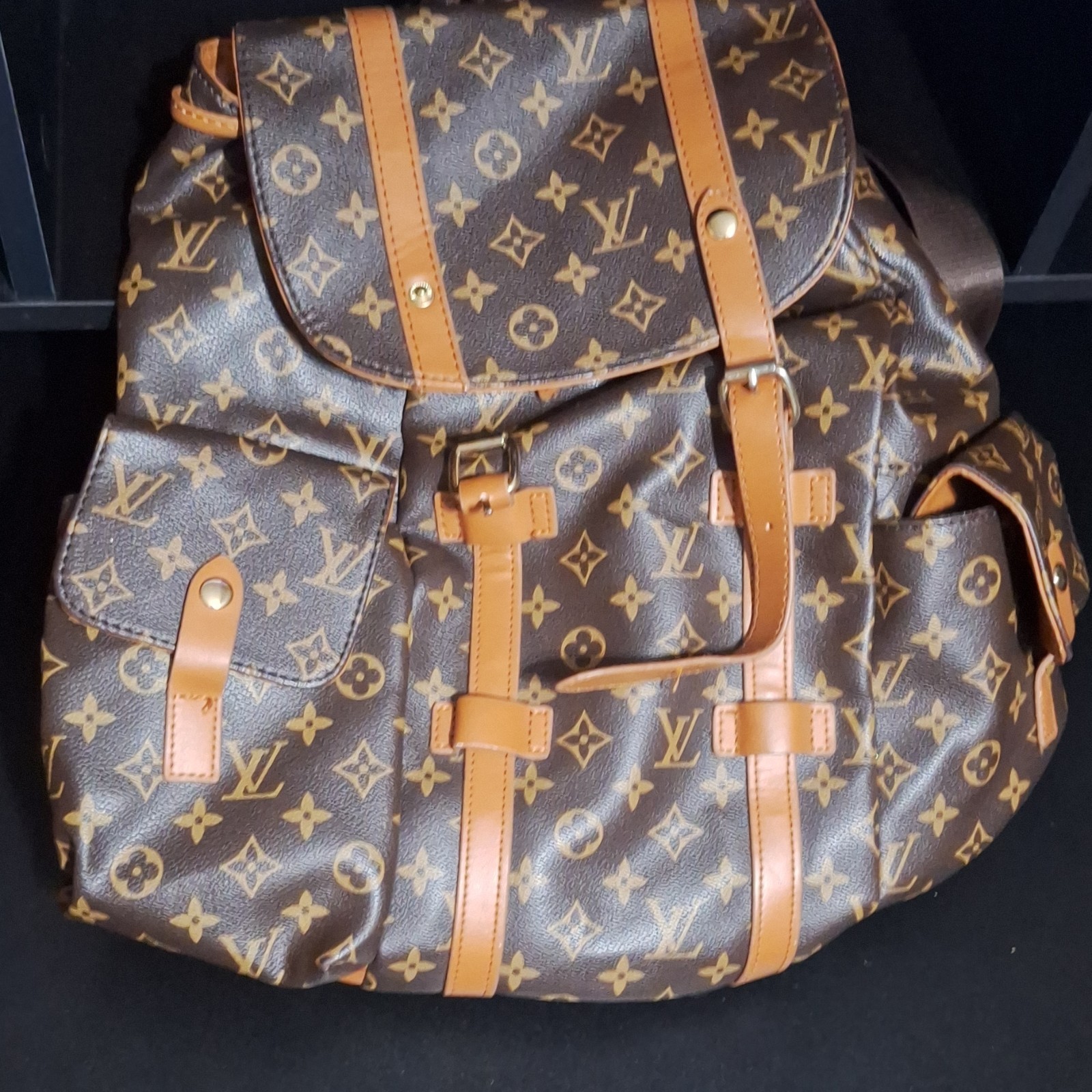Louis Vuitton Monogram Drawstring Backpack Brown Gold Hardware Inner Pockets