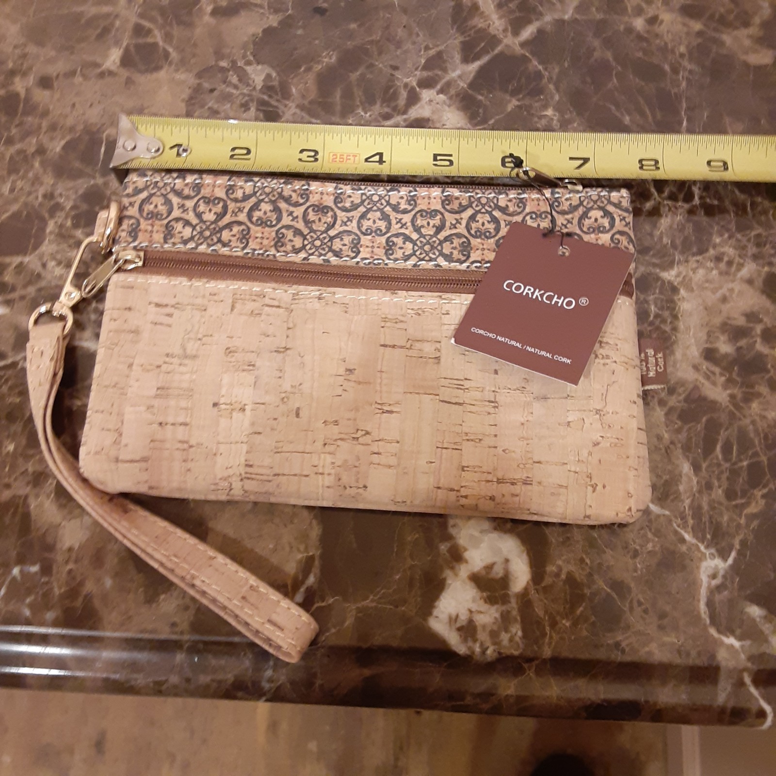 This 7.5 inch clutch made by Corkcho is new with tag
