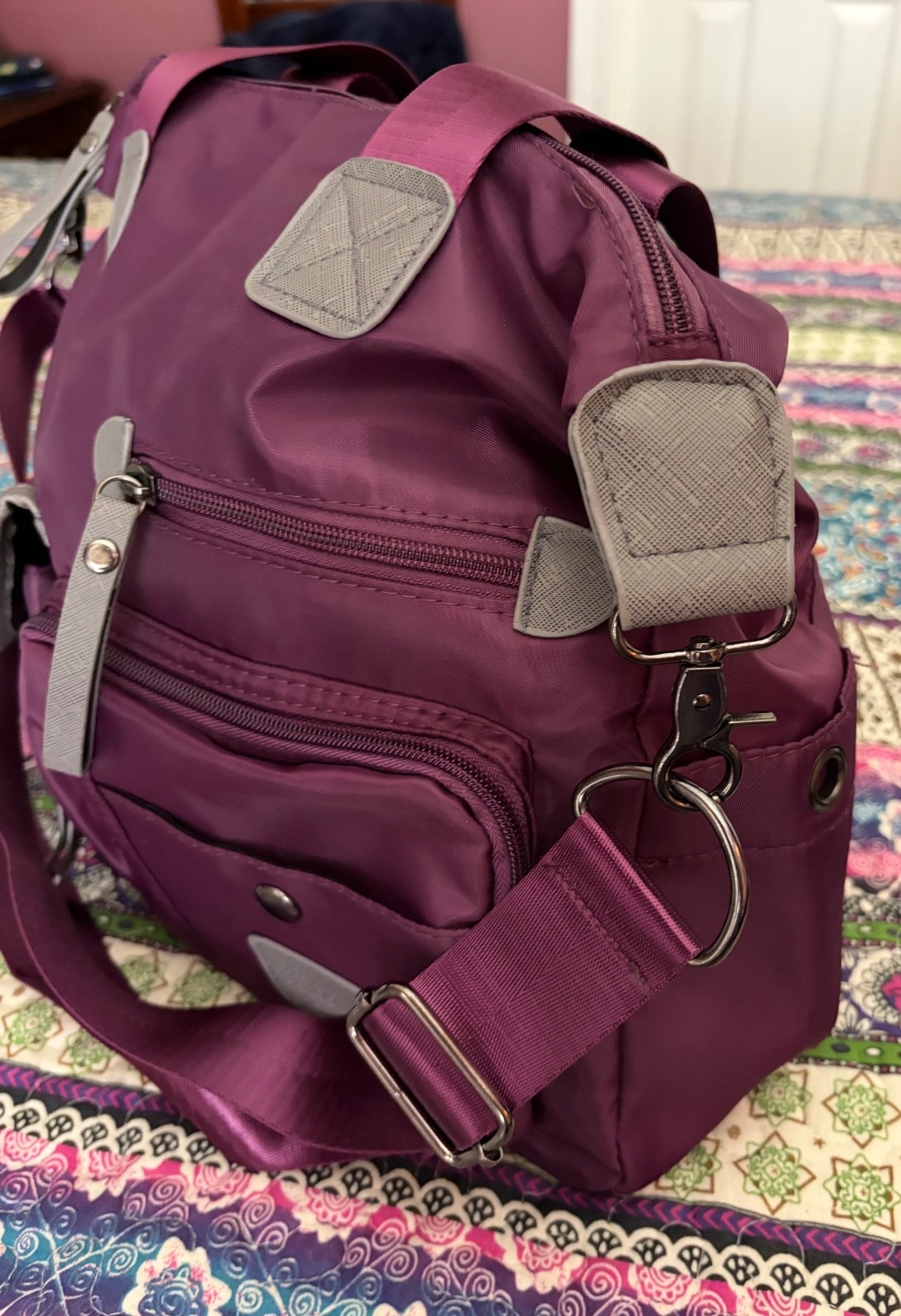 Jinpingpiju purple travel bag with many pockets and attachable strap