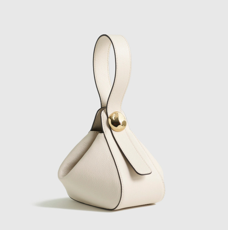 The Sculpted Metal Wristlet Bag