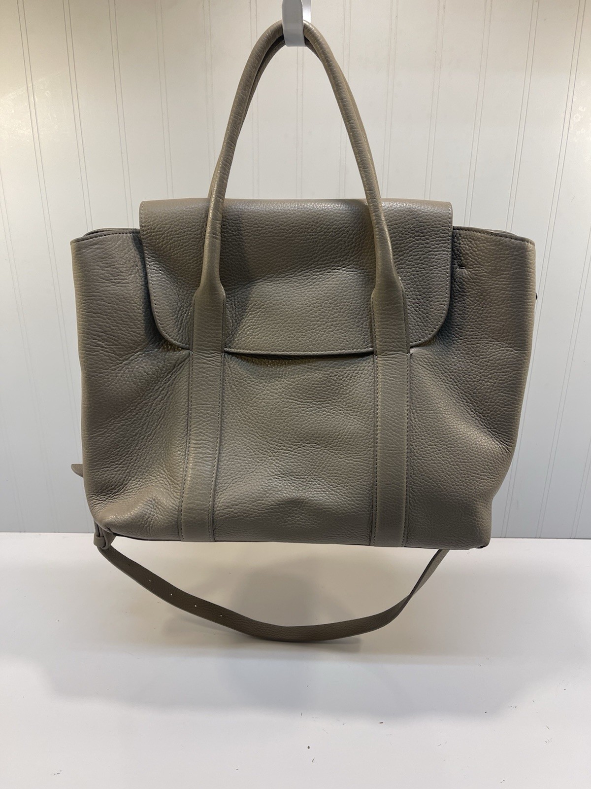 Cuyana Trapeze Satchel crafted, Italian pebbled leather in neutral taupe.