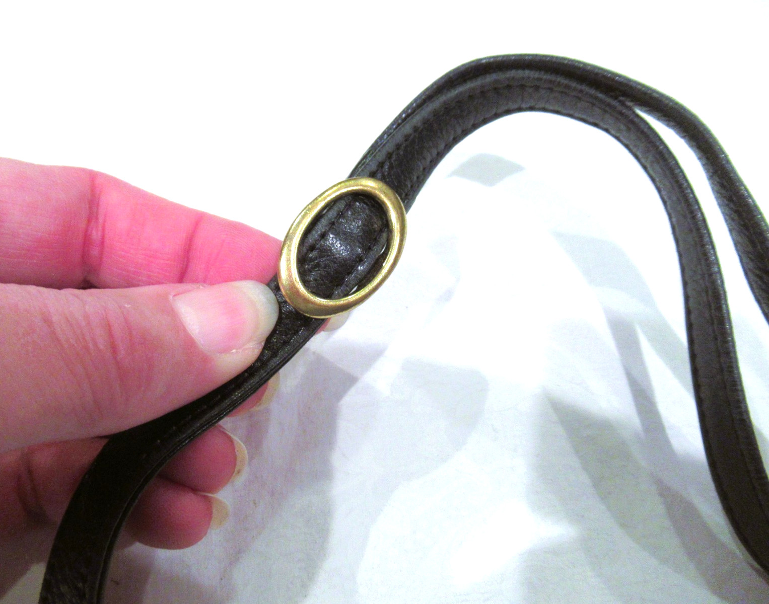 Libaire black leather purse, black interior, slot pocket on the back