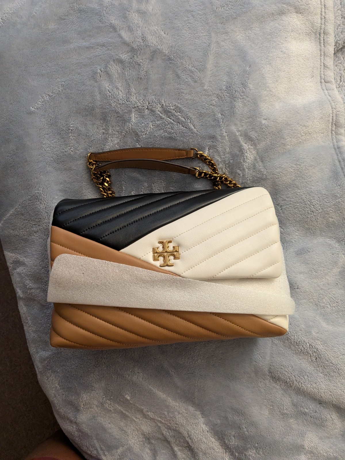 Tory Burch Amazing handbag that you Can Dress Up Or Down.