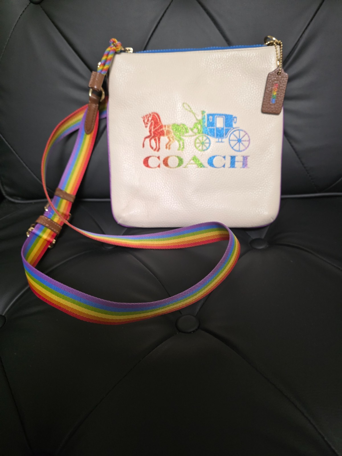Coach Jes Slim crossbody bag in chalk leather featuring a rainbow carriage
