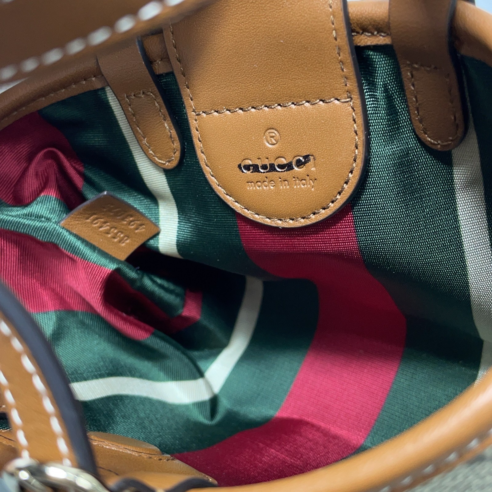 GUCCI GG Emblem Handbag Featuring the signature GG pattern handbag mini size