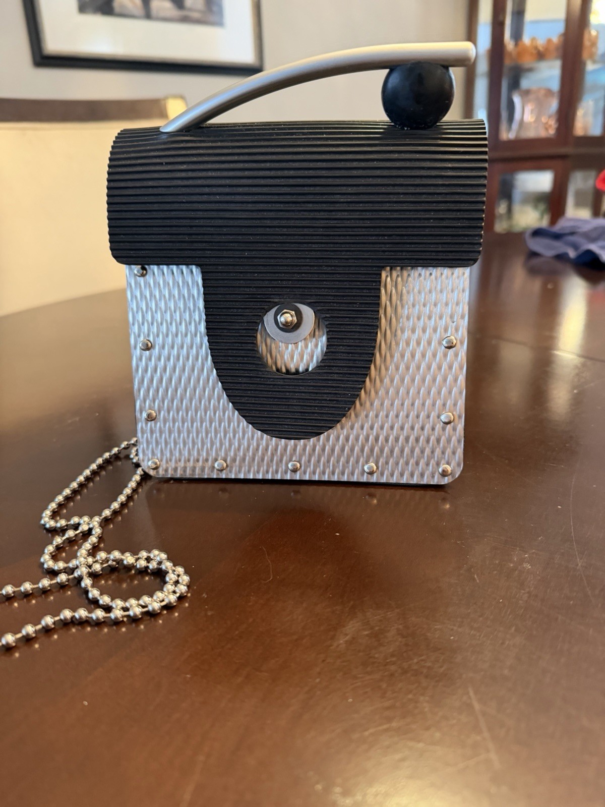 VINTAGE BLACK RUBBER AND STAINLESS STEEL CROSSBODY BAG BY DESIGNER GLORIA GERBER