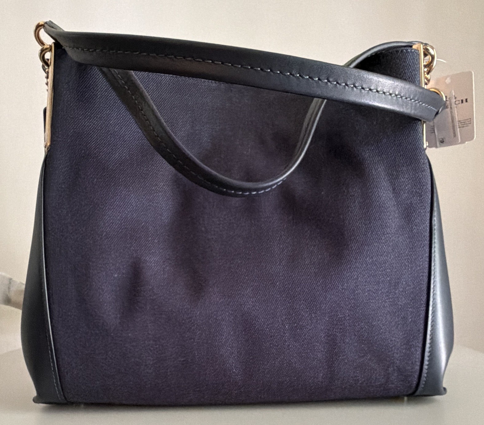 Coach Shoulder Bag crafted in a “Denim /Navy Jacquard pattern
