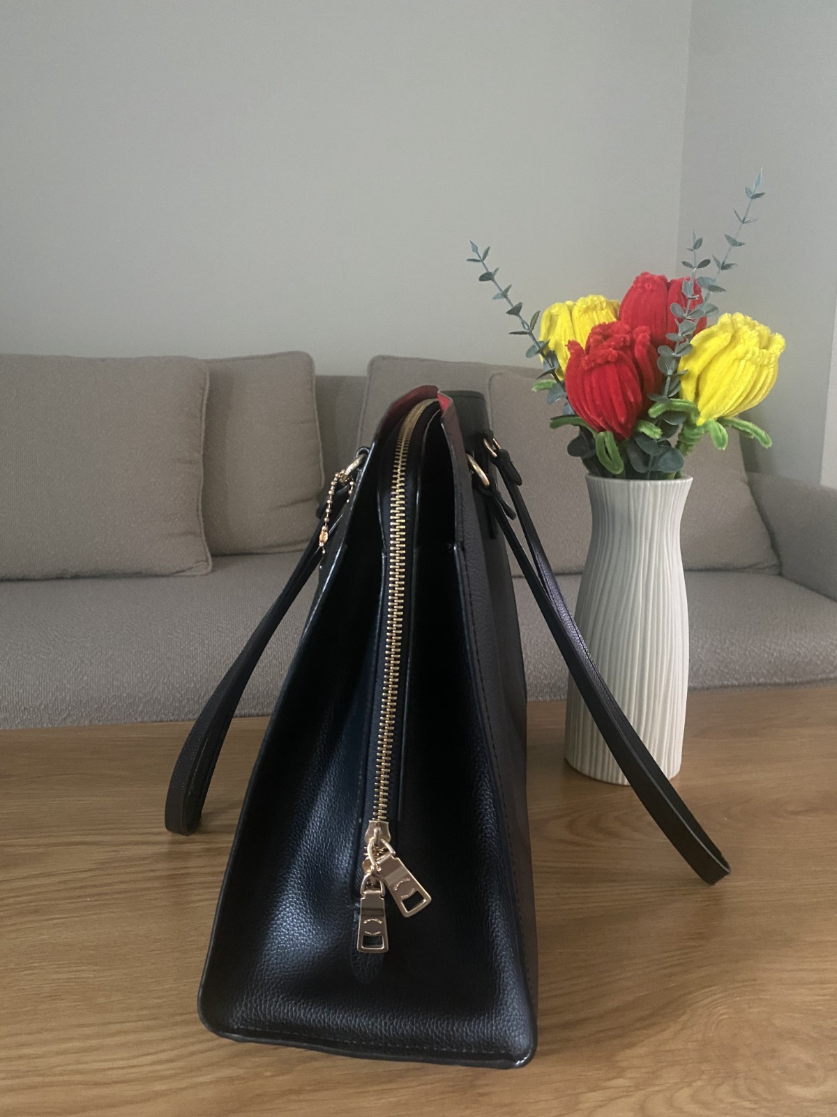 Coach Tatum Carryall 40 tote bag in black/true red. Used, in good condition.