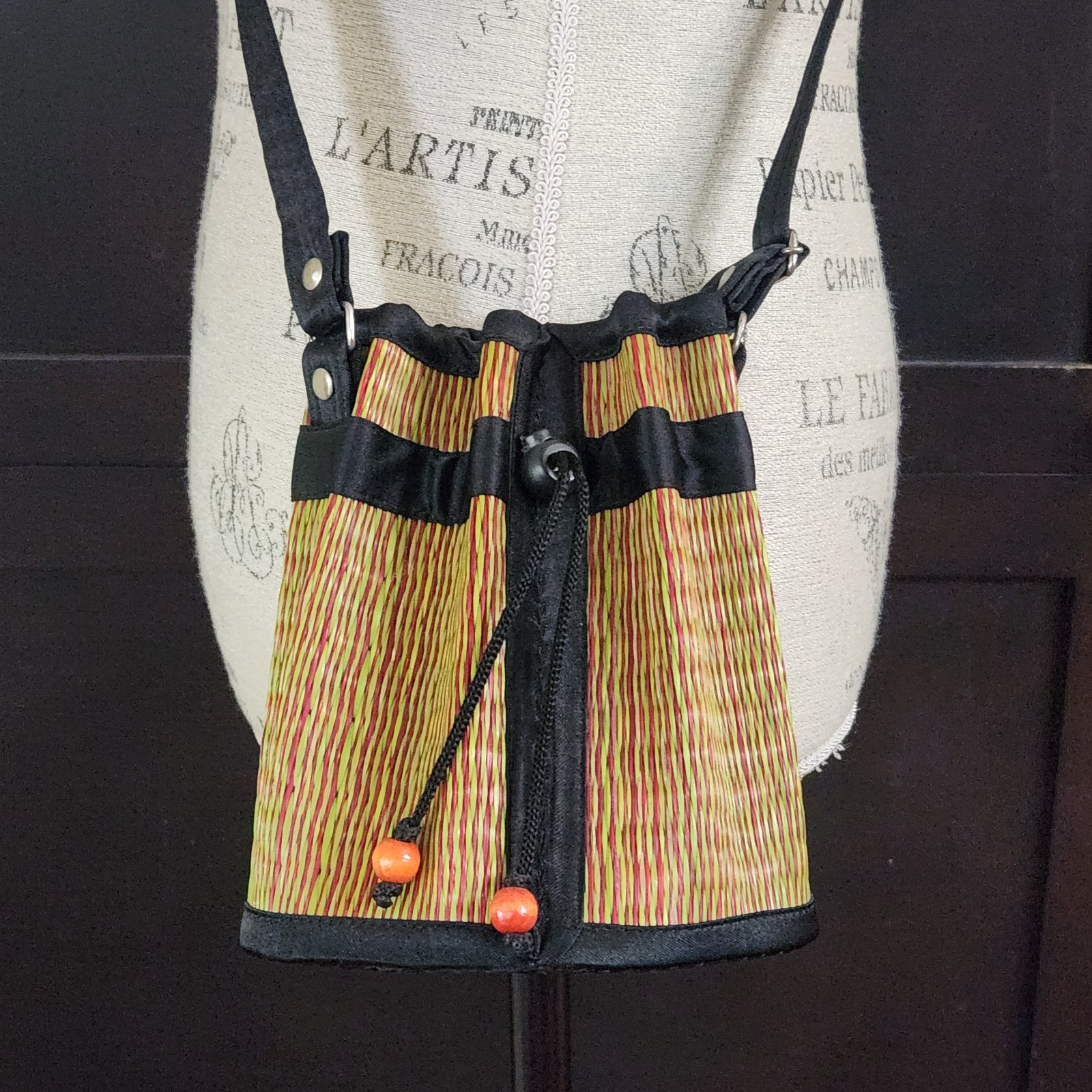 Saraye Tatami Woven Cinch Bucket Bag – Red & Green Grass Stripe