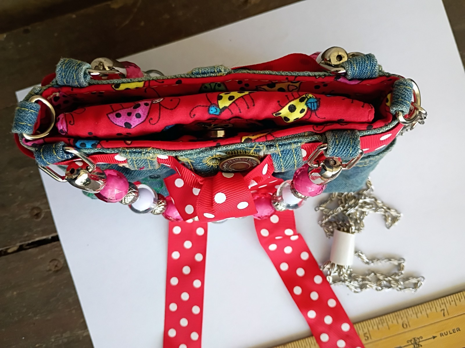 Small, Blue Jean Embroidered Lady Bug with handles and long chain strap