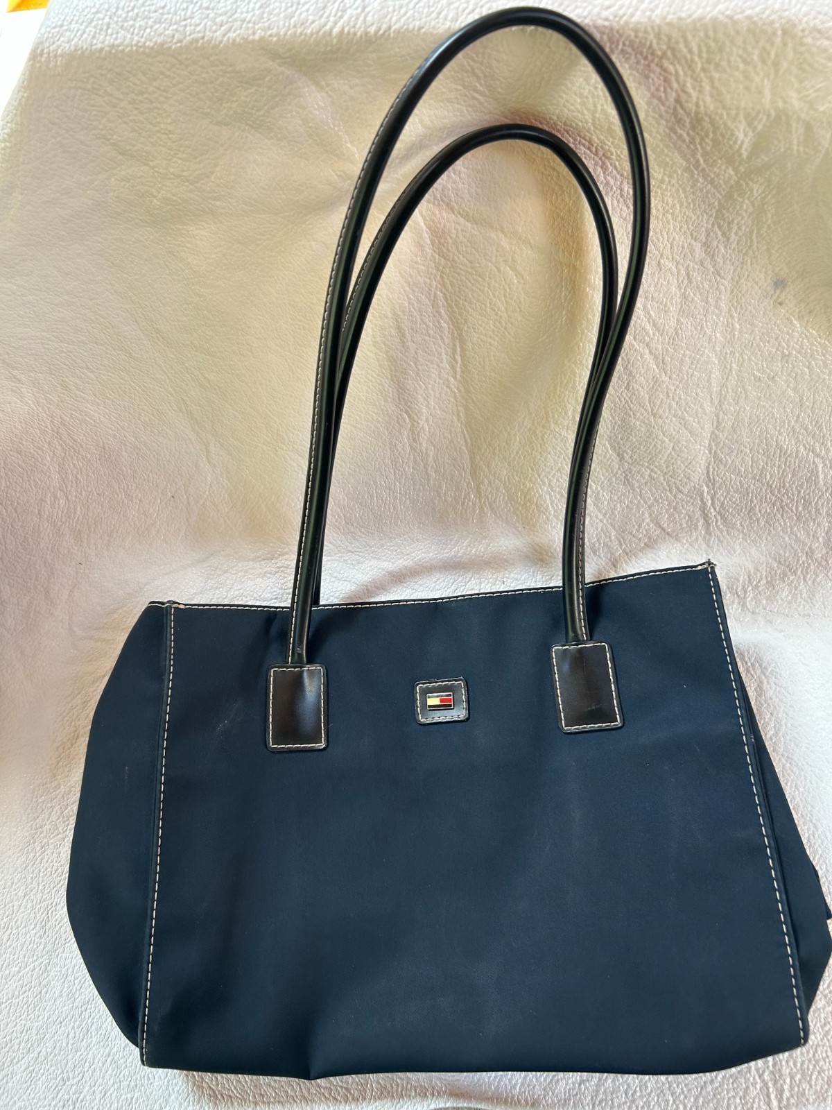 Tommy Hilfiger navy blue canvas hand bag with magnetic closure