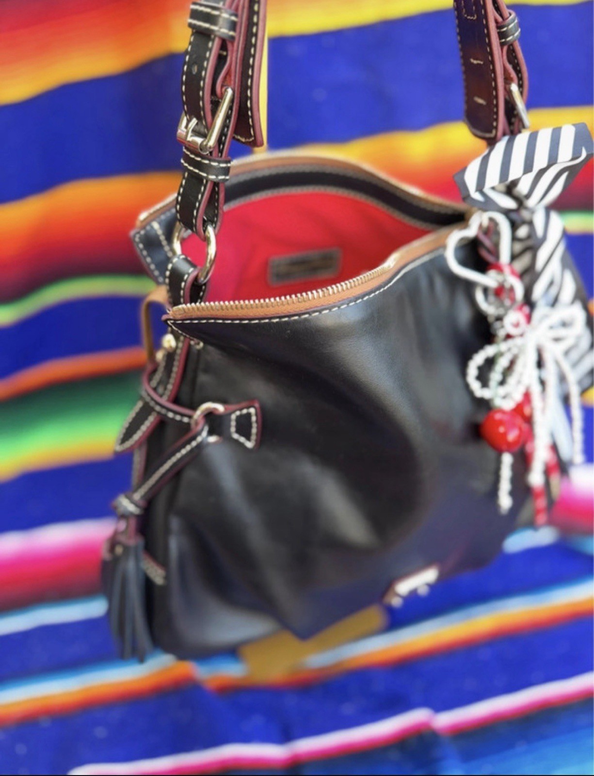 Dooney & Bourke Black Shoulder Bag. Charms included.