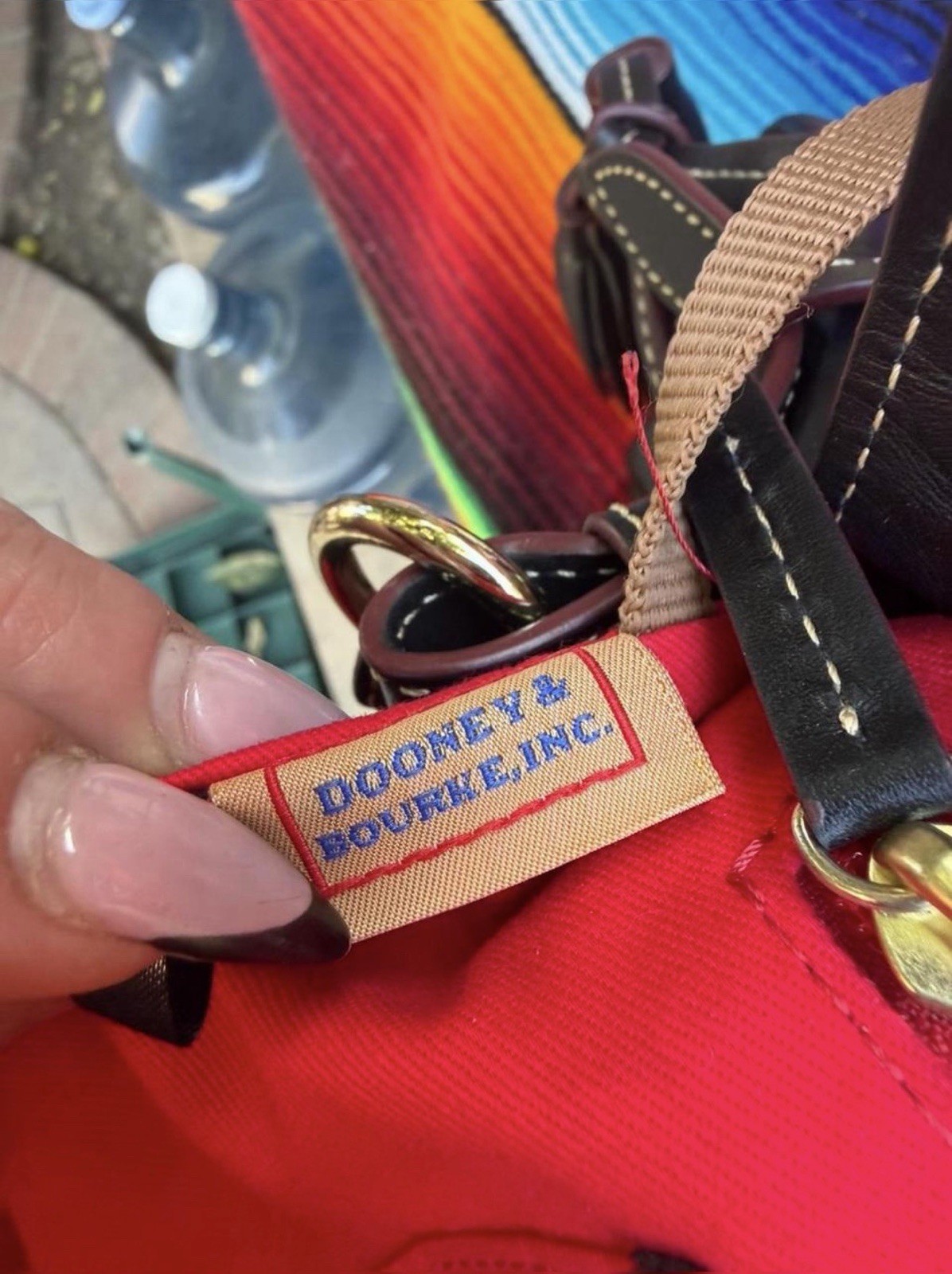 Dooney & Bourke Black Shoulder Bag. Charms included.
