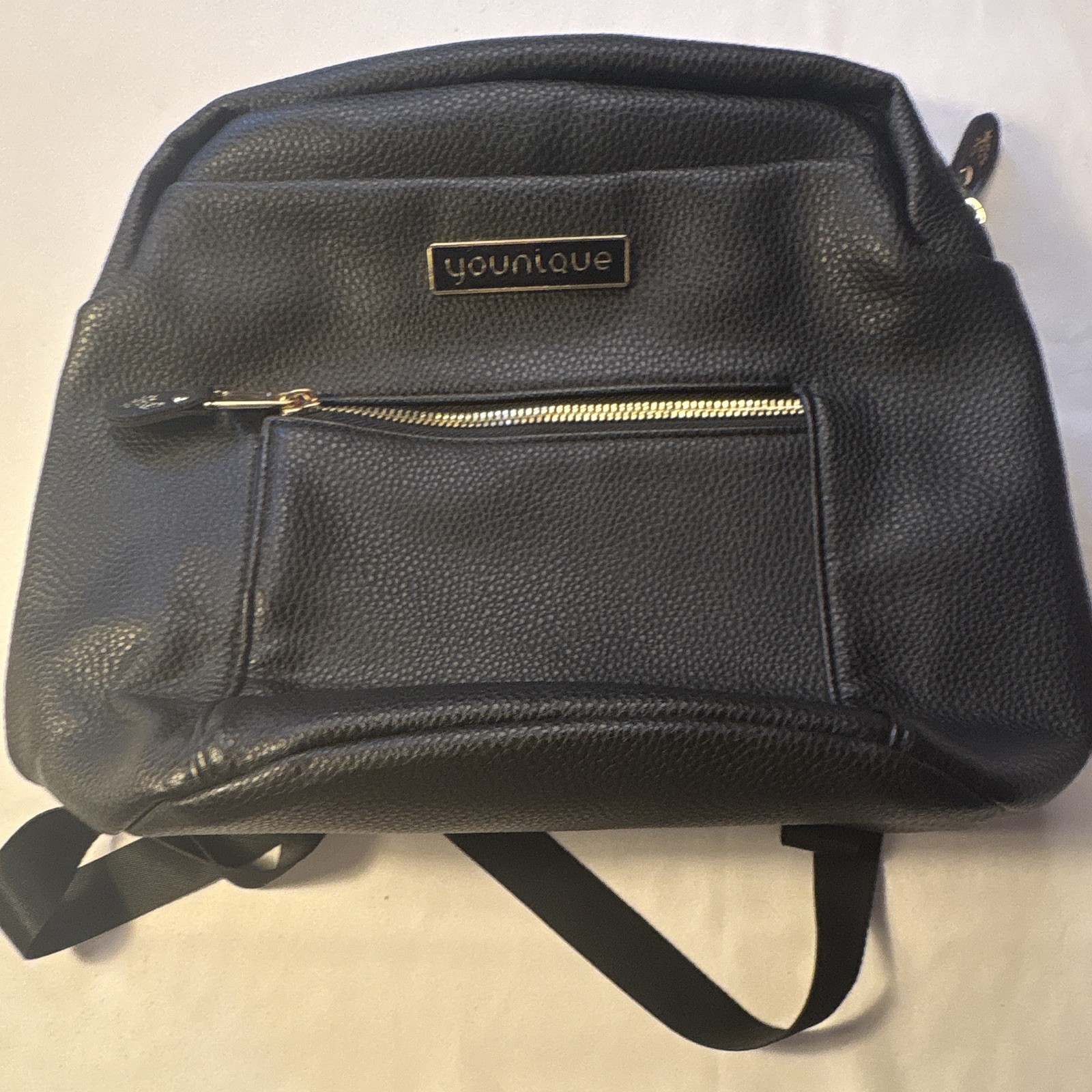 Younique Black Pebbled Backpack with Gold Hardware & Zip, Pockets, Purple Lining