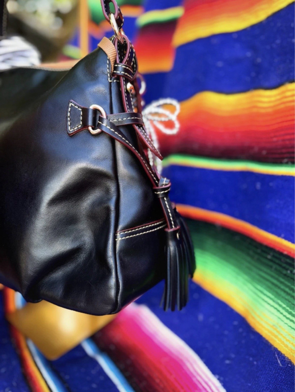 Dooney & Bourke Black Shoulder Bag. Charms included.