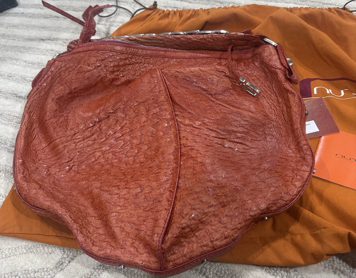 Nuti Orange Crescent Shoulder Bag Silver Hardware Zip Inner Pockets Dust Bag