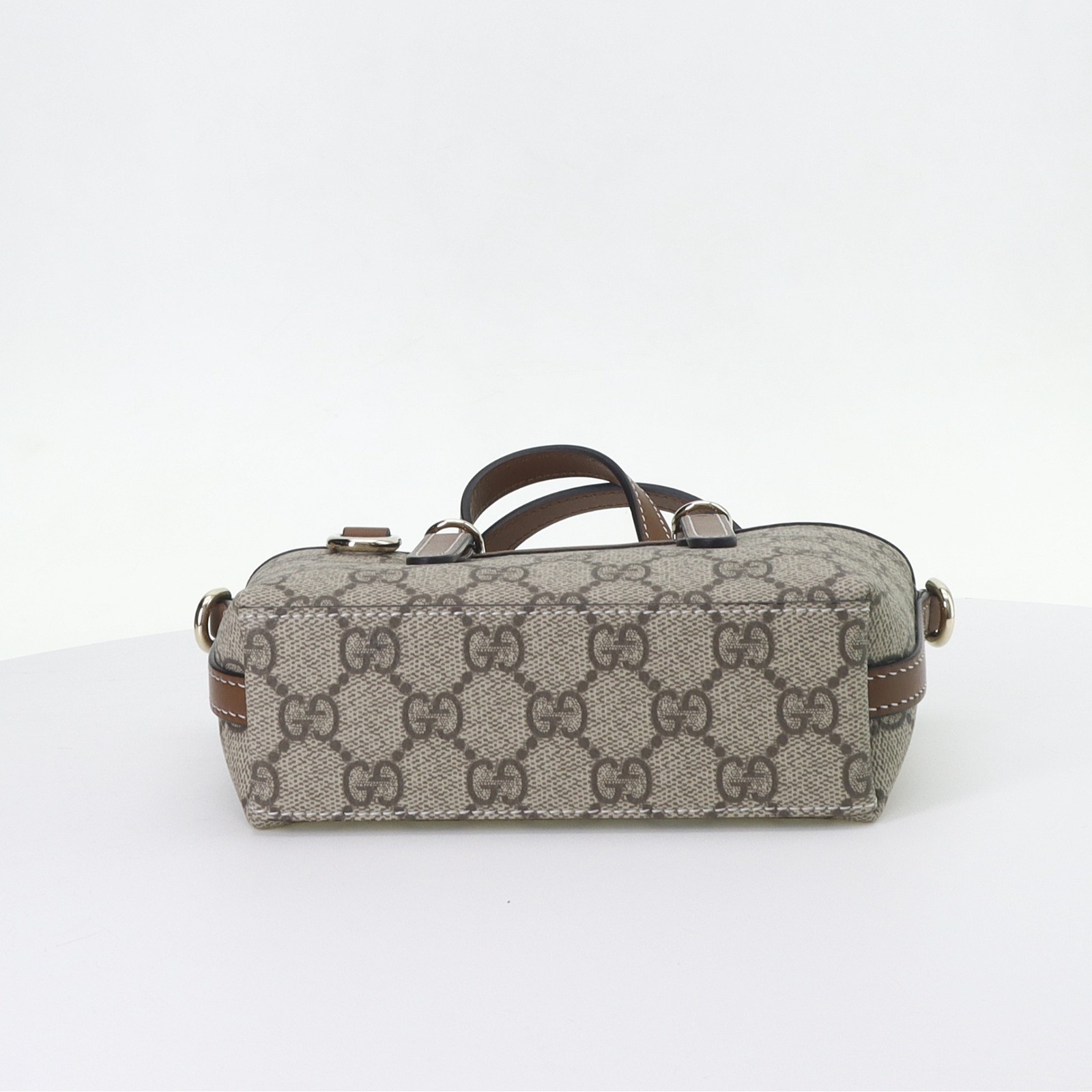 GUCCI GG Emblem Handbag Featuring the signature GG pattern handbag mini size