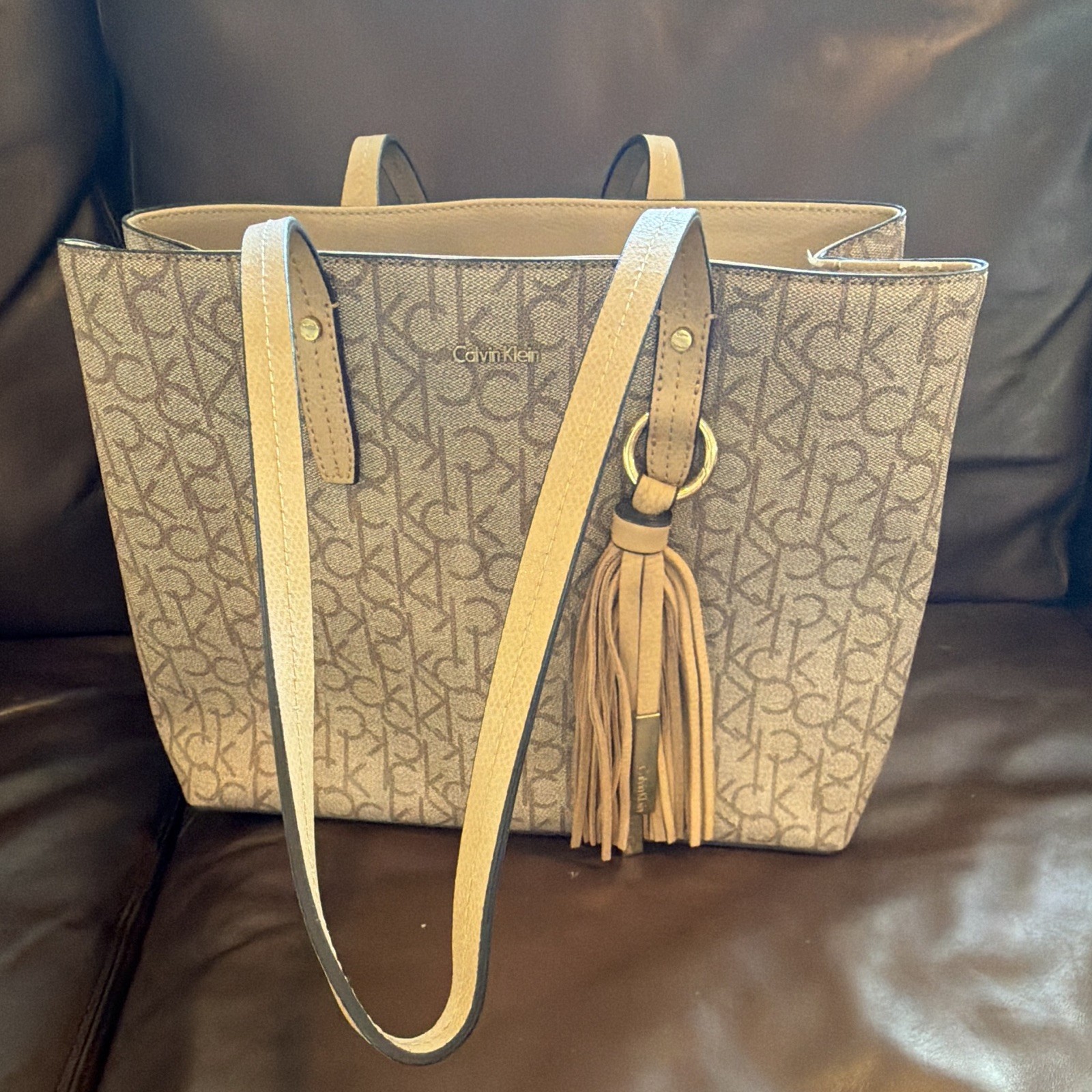 Calvin Klein CK Monogram Tote Beige Double Handles Inner Pockets Tassel Charm