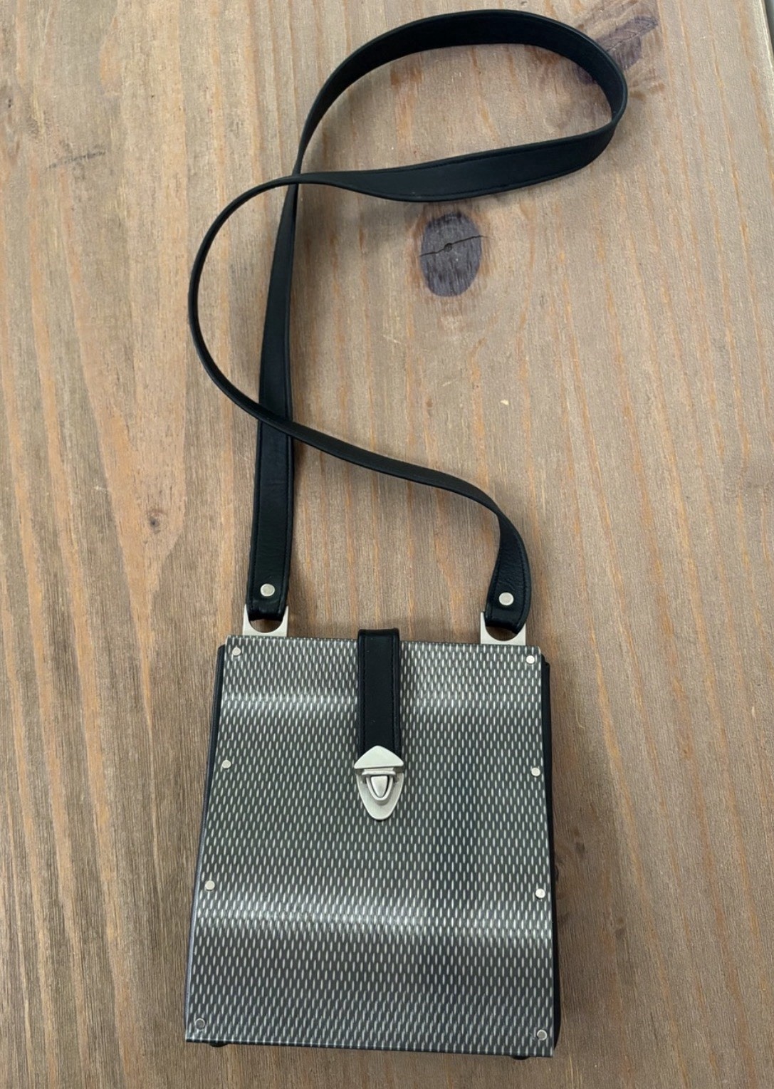 Wendy Stevens industrial stainless steel and leather drop bag mini $595