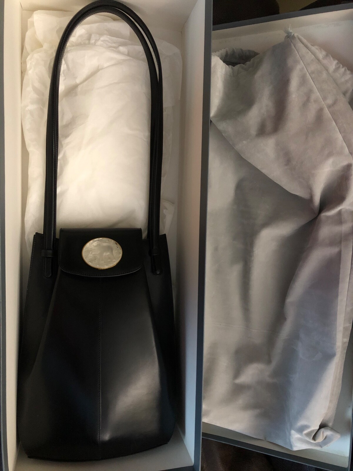 Lalique Collectors!! Rare, Lalique Black Purse with oval embellishment.