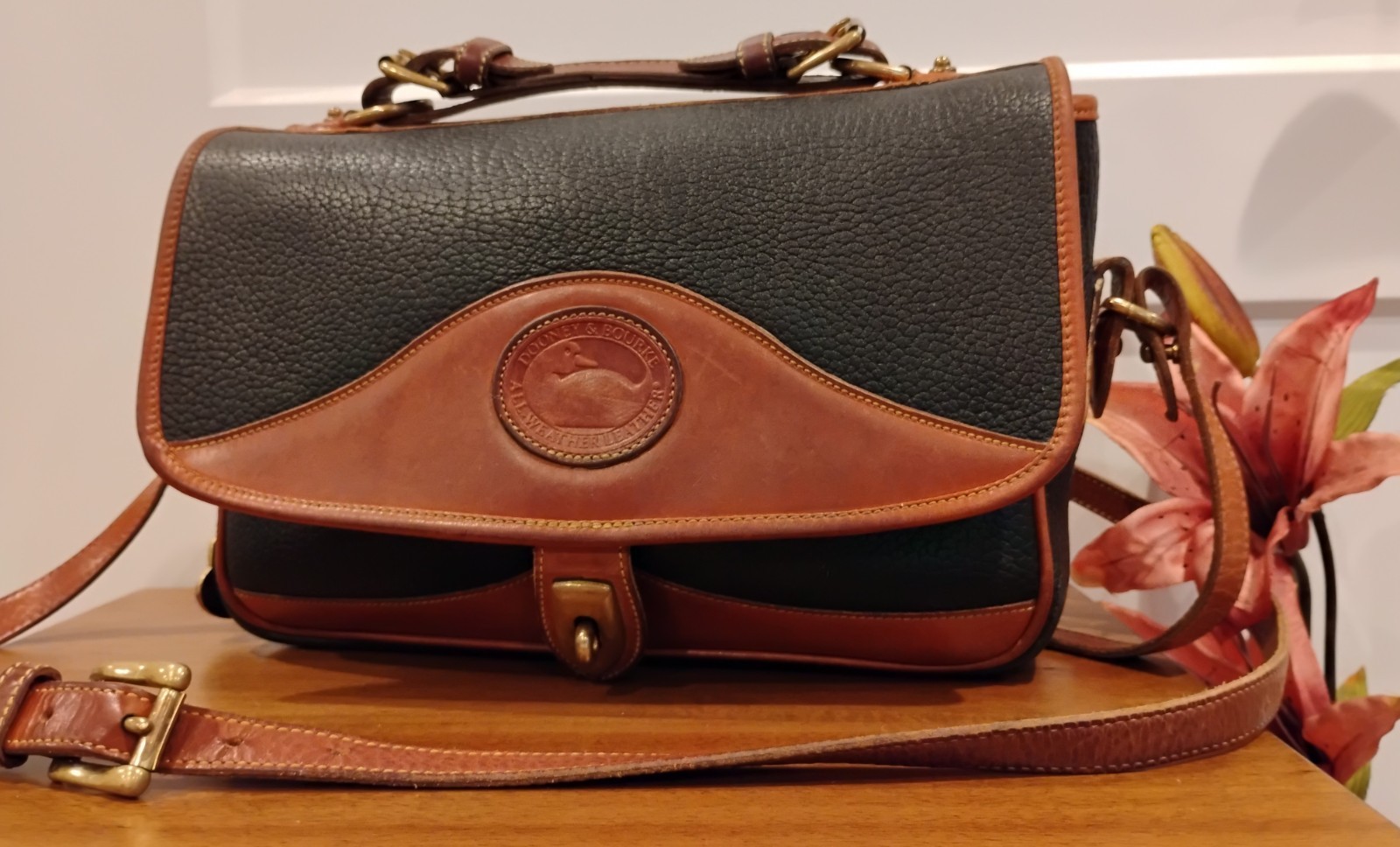 Vintage Dooney & Bourke All-Weather Leather Crossbody Bag Black with Brown Trim