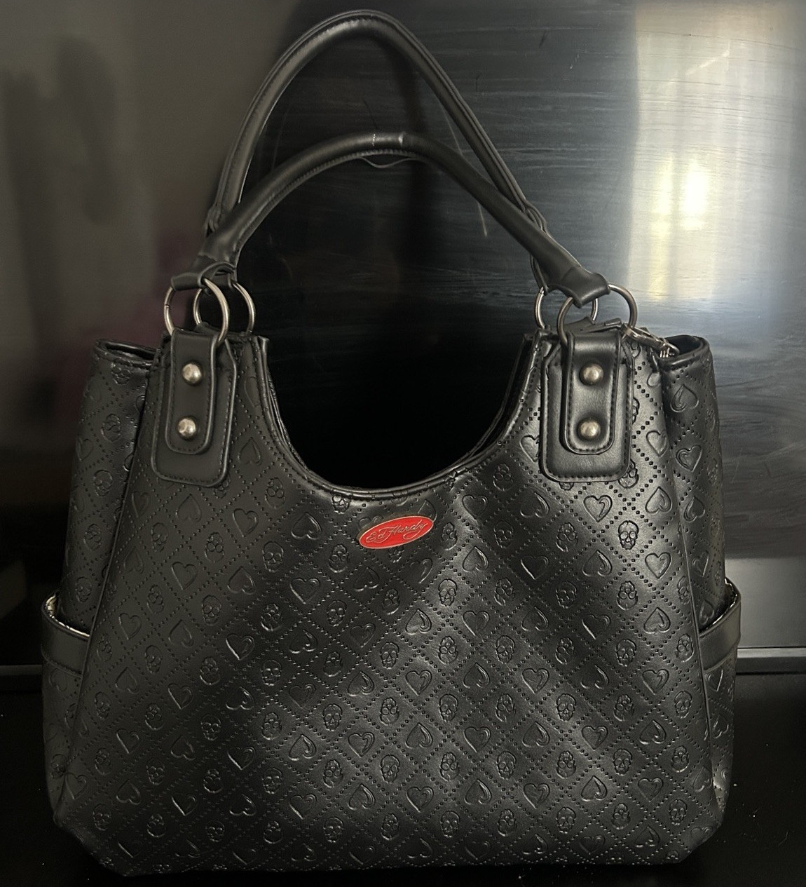 Large Ed hardy black leather shoulder bag with silver hardware and skull pattern