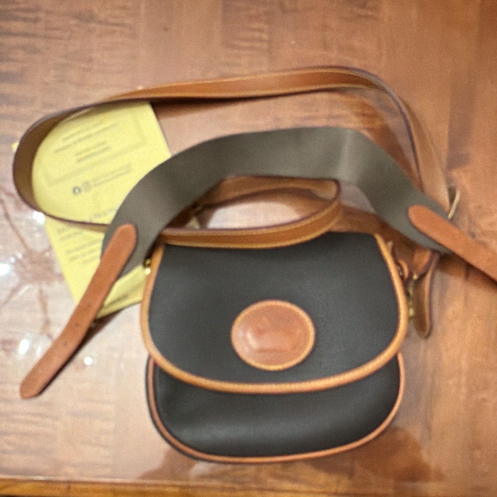 Dooney & Bourke Small Saddle Crossbody Black/Brown Pebbled Zip, Dust Bag