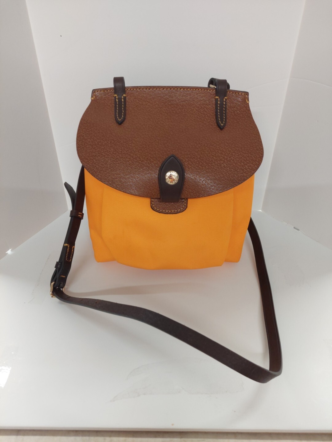 Dooney And Bourke Alto Collection Tangerine Canvas Crossbody Saddle Bag
