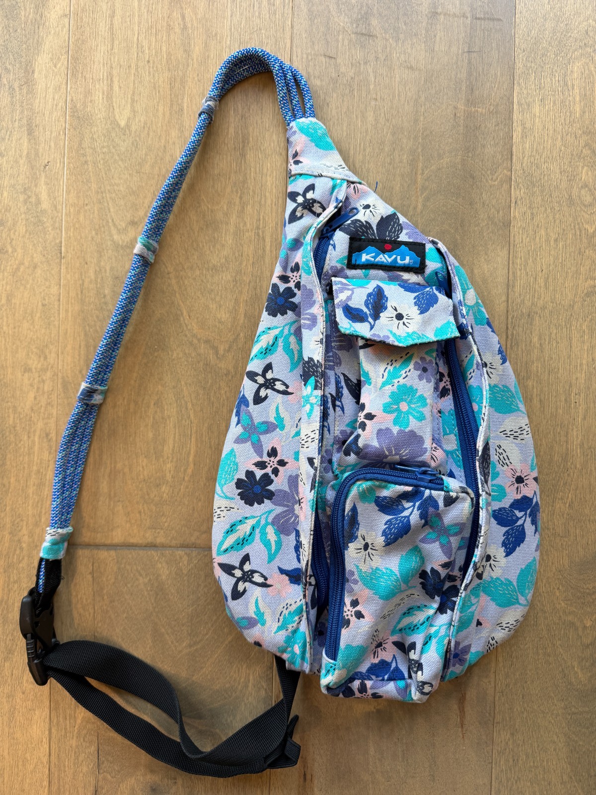 KAVU Mini Rope Sling Bag Crossbody Backpack Purple Teals Blue Flowers Print