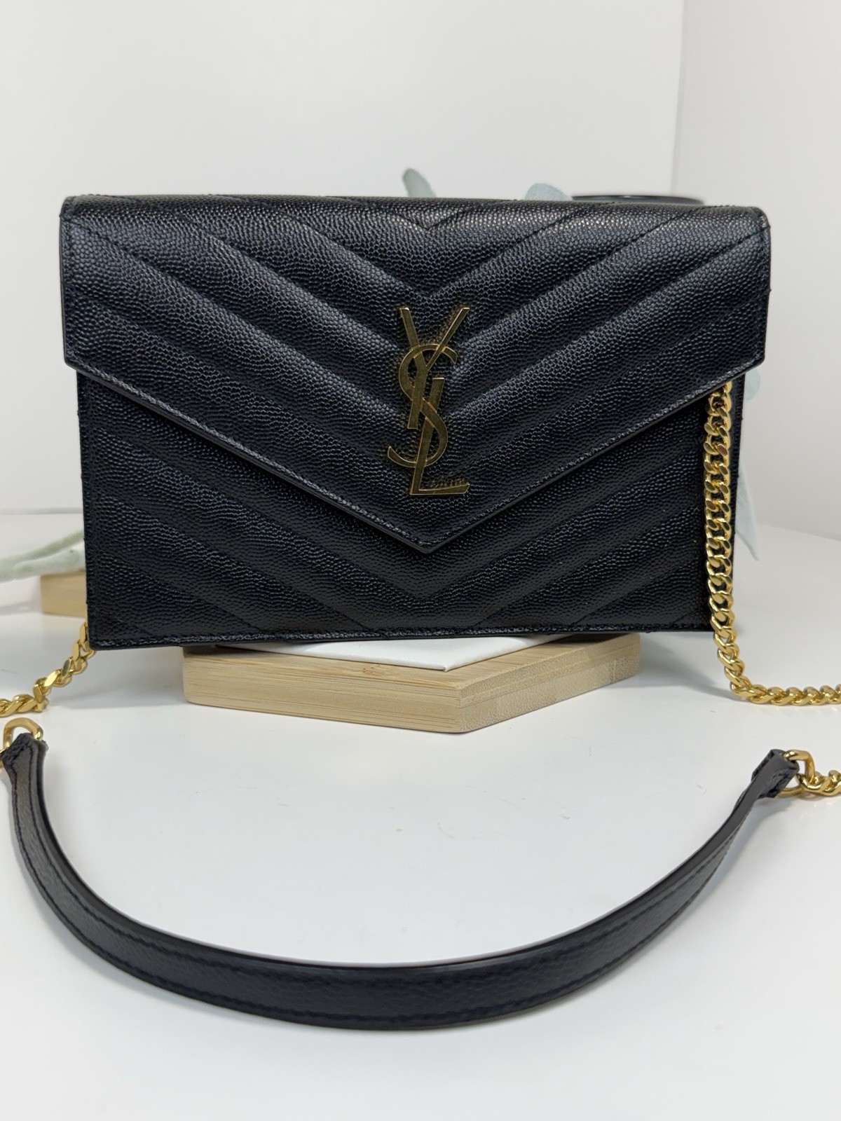 YSL CASSANDRE ENVELOPE CHAIN WALLET IN GRAIN DE POUDRE LEATHER