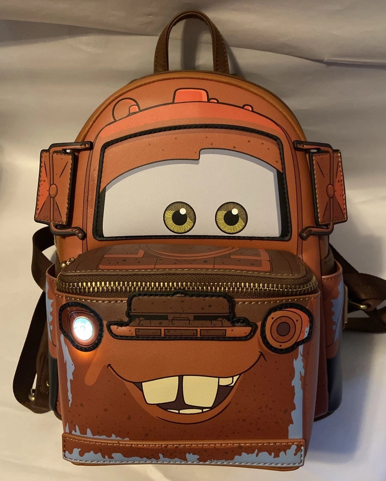 Loungefly Disney Pixar Cars Figural Tow Mater Light Up Mini Backpack NWT (BAGS)