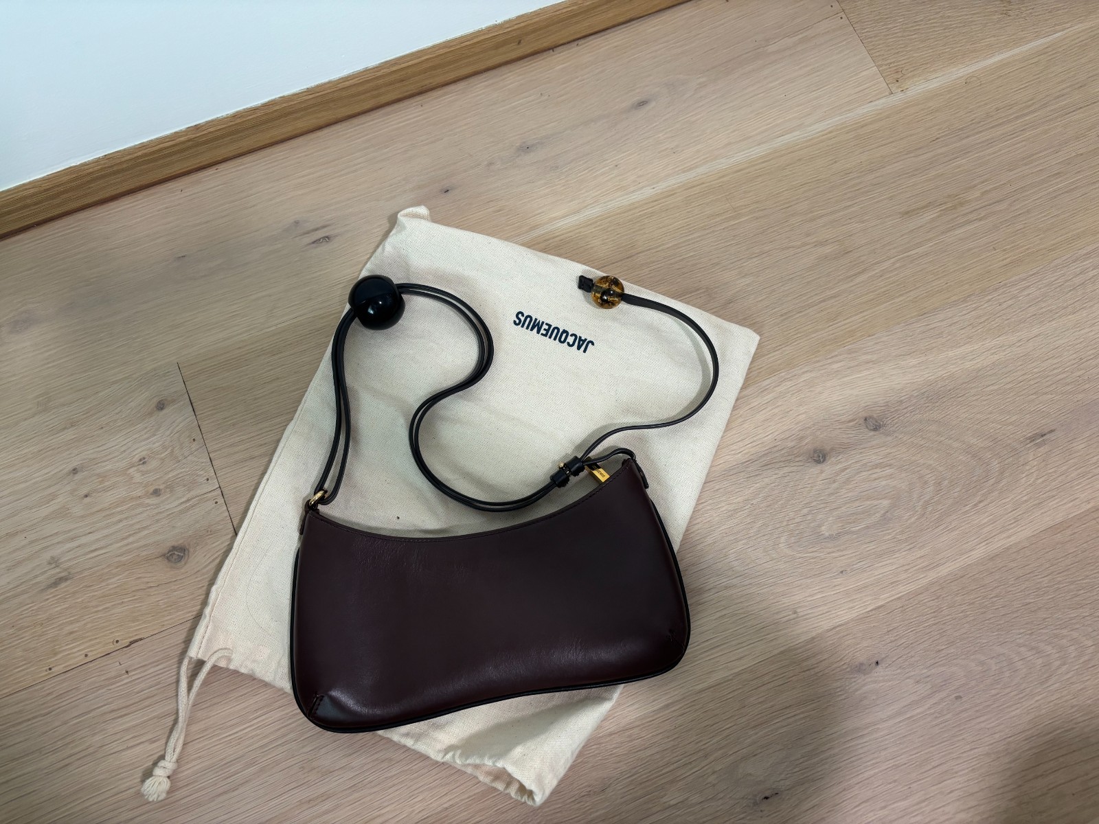 Jacquemus Le Bisou Perle Shoulder Bag Dark Brown Leather – Gold Hardware – Dust