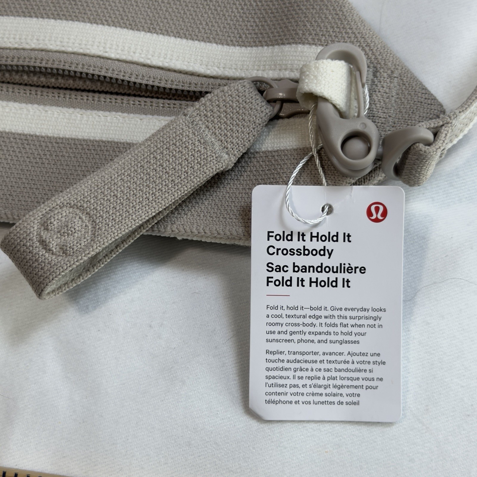 lululemon Fold it Hold it Crossbody Bag Adjustable Strap Zip Closure Folds Flat