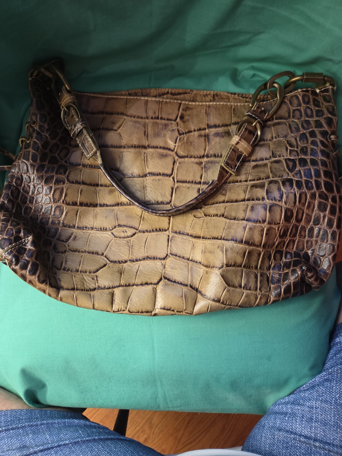 This is a Robert Pietri GENUINE LEATHER tan Crock Enbossed Bag