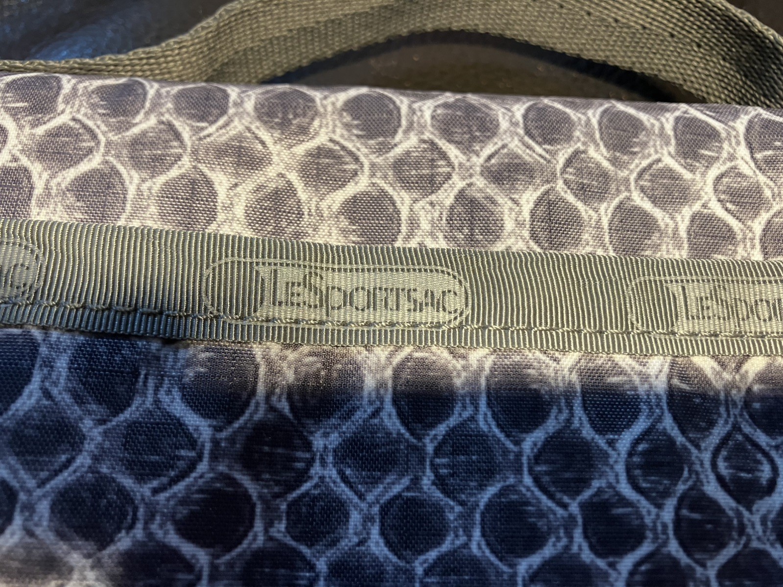 LeSportsac Grey Snake Pattern Hand Held Clutch Wallet 9.25 long X 5.25 in tall.