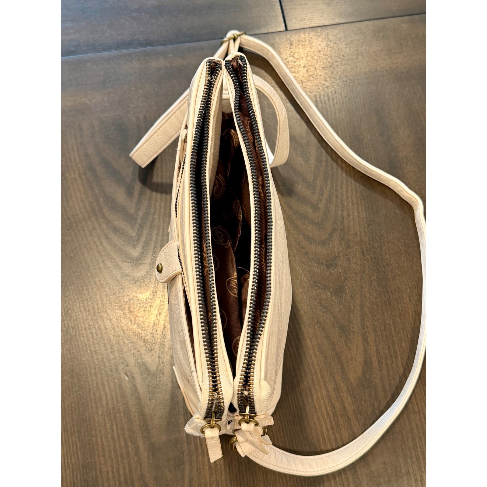White Mountain Cream Shoulder bag crossbody with adjustable strap. Faux leather