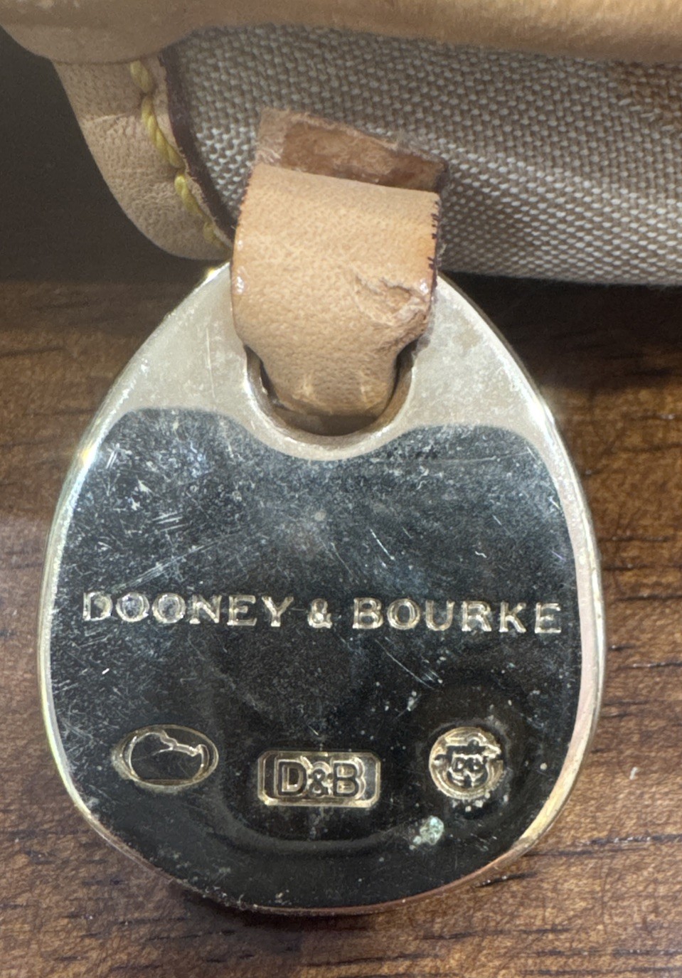 Dooney and Bourke Logo Flap Button Closure Wristlet Light Tan No Strap See Photo