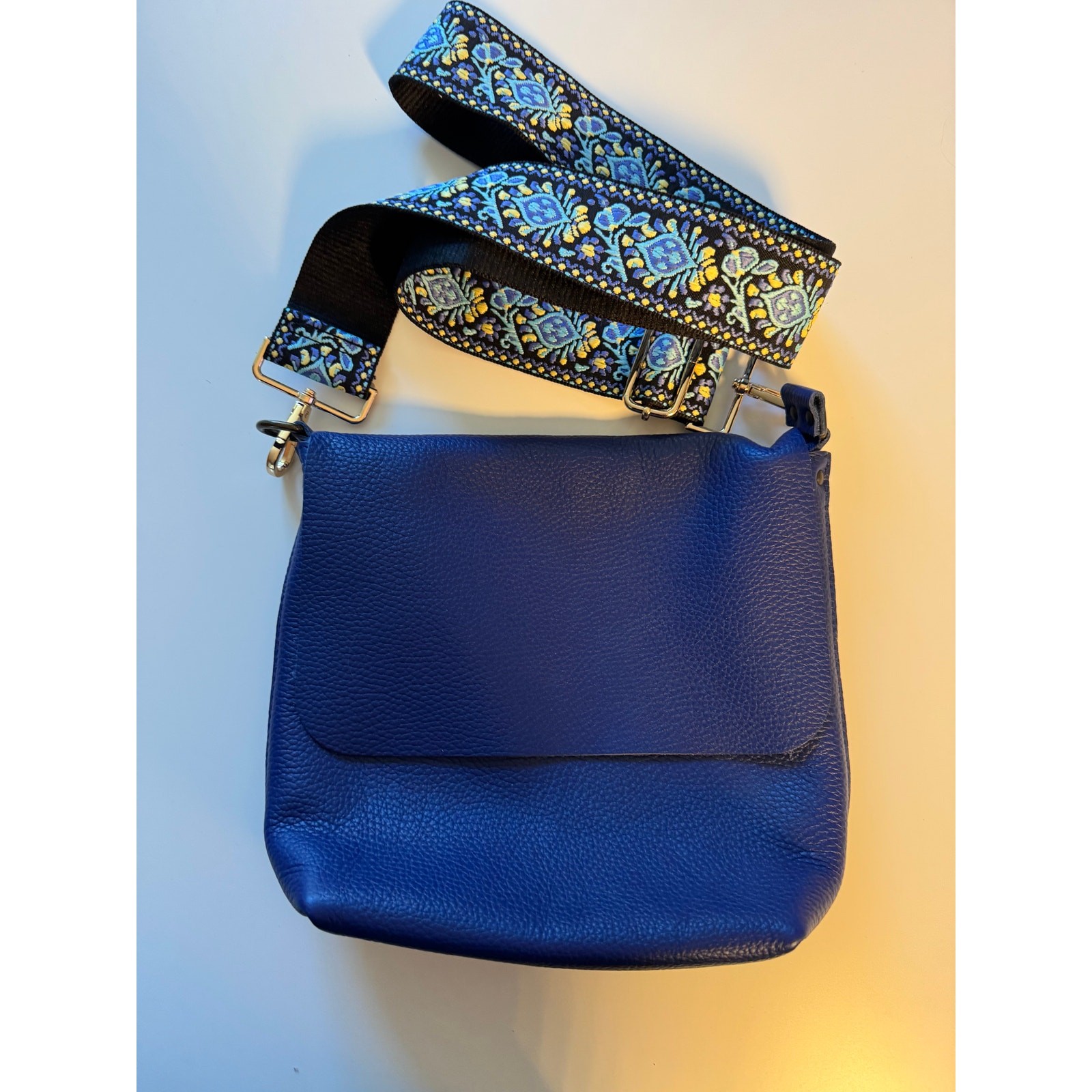 Electric Blue Pebbled Leather Crossbody bag with Pattern Strap Never Used