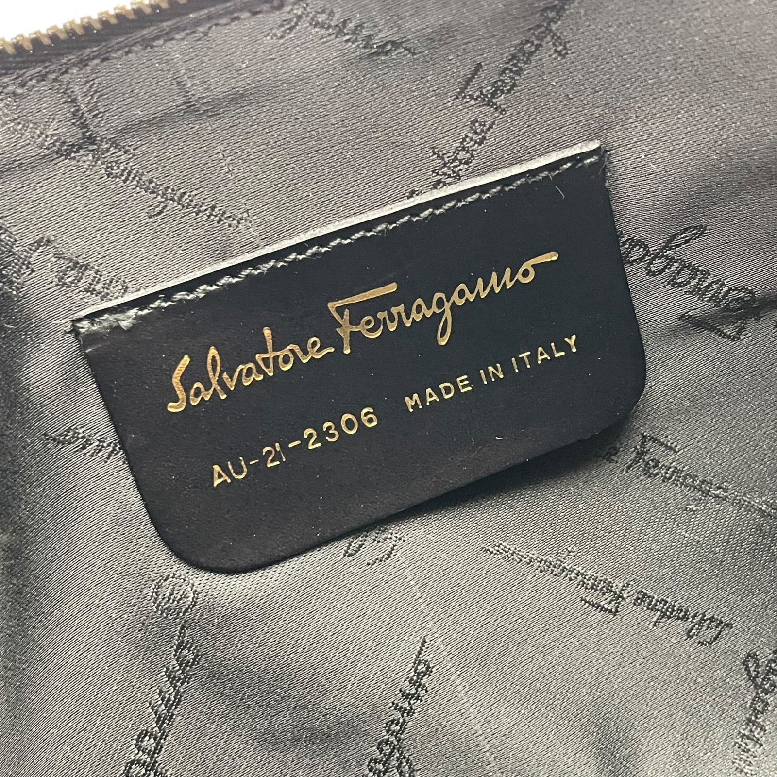 Authentic Salvatore Ferragamo Gancini Leather Accessory Pouch Black Gold