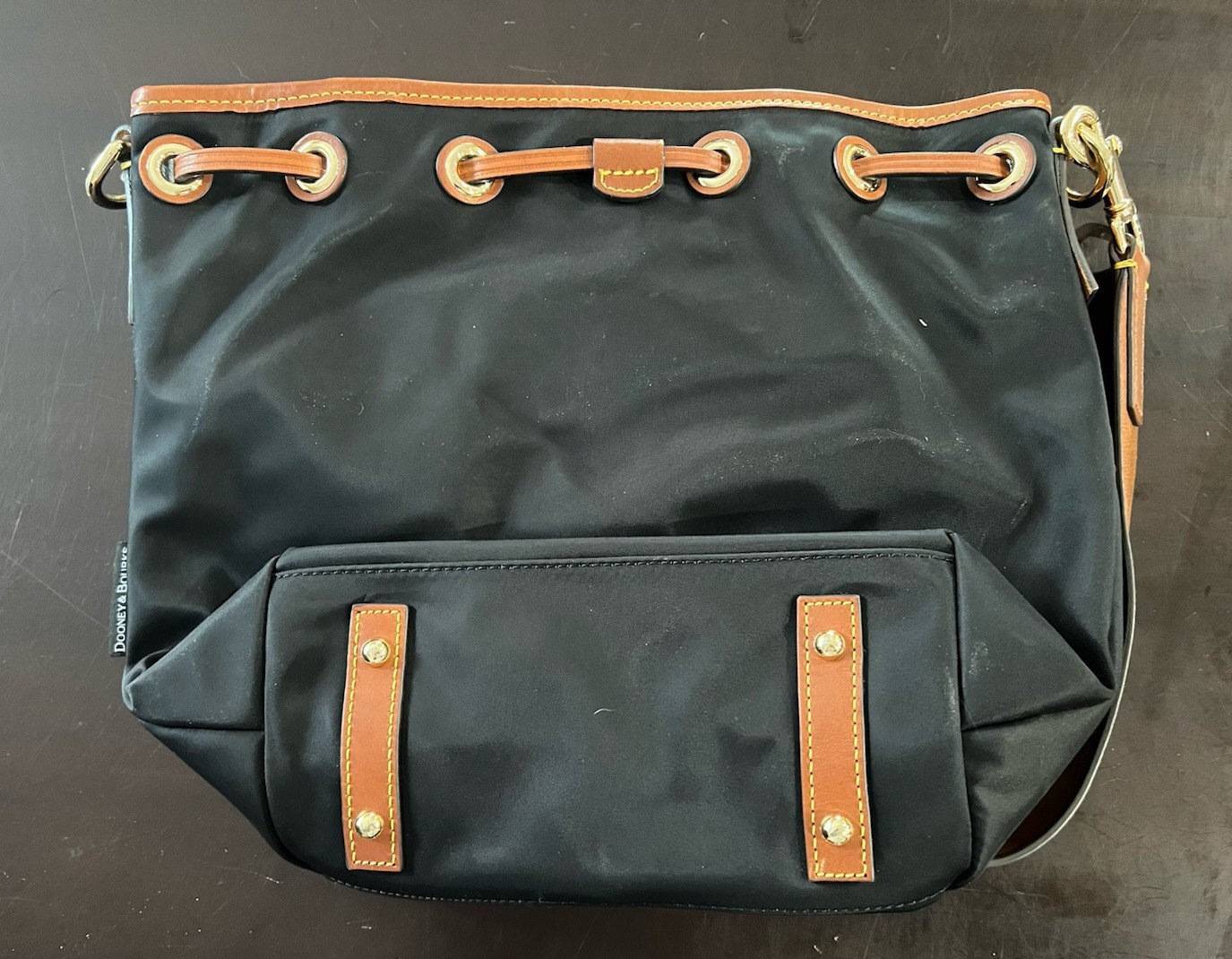 Dooney & Bourke Black Bucket Bag with Brown Leather Trim & Detachable Strap