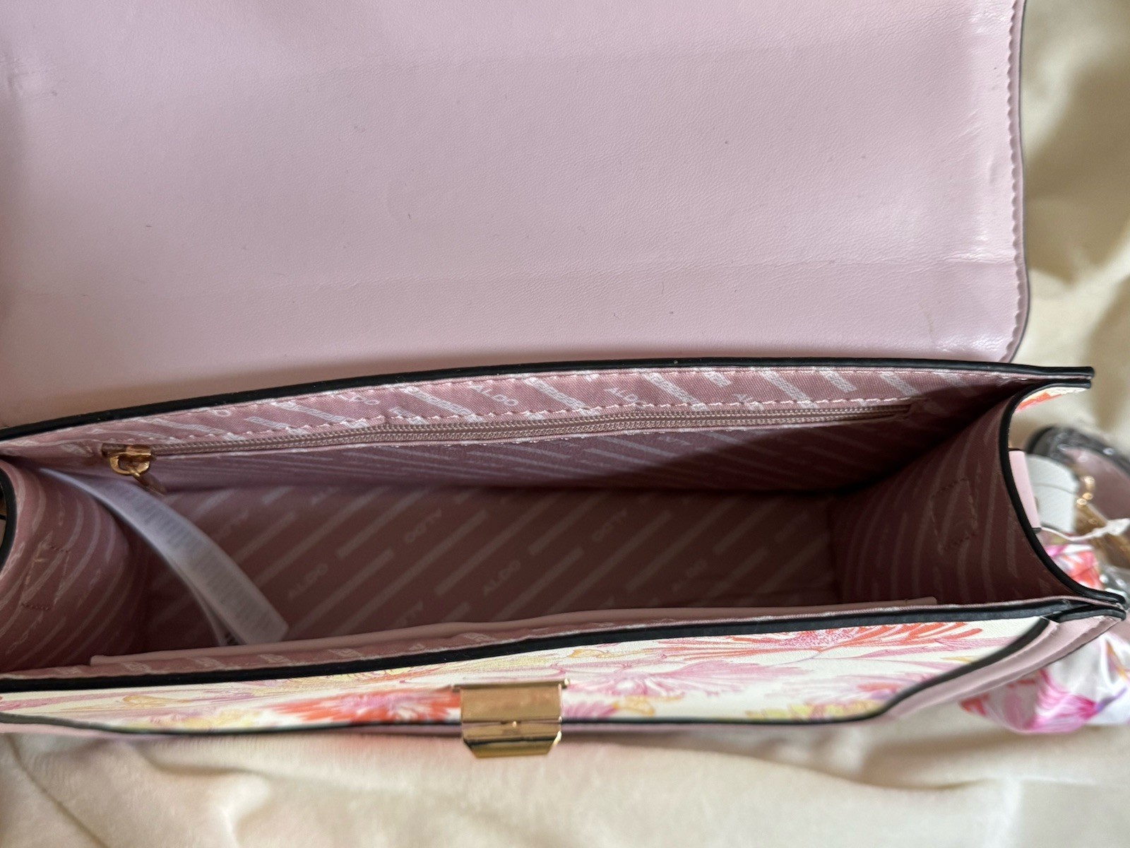 Brand new Aldo bag. 2 additional handle accessories. beautiful scarf wrapping.