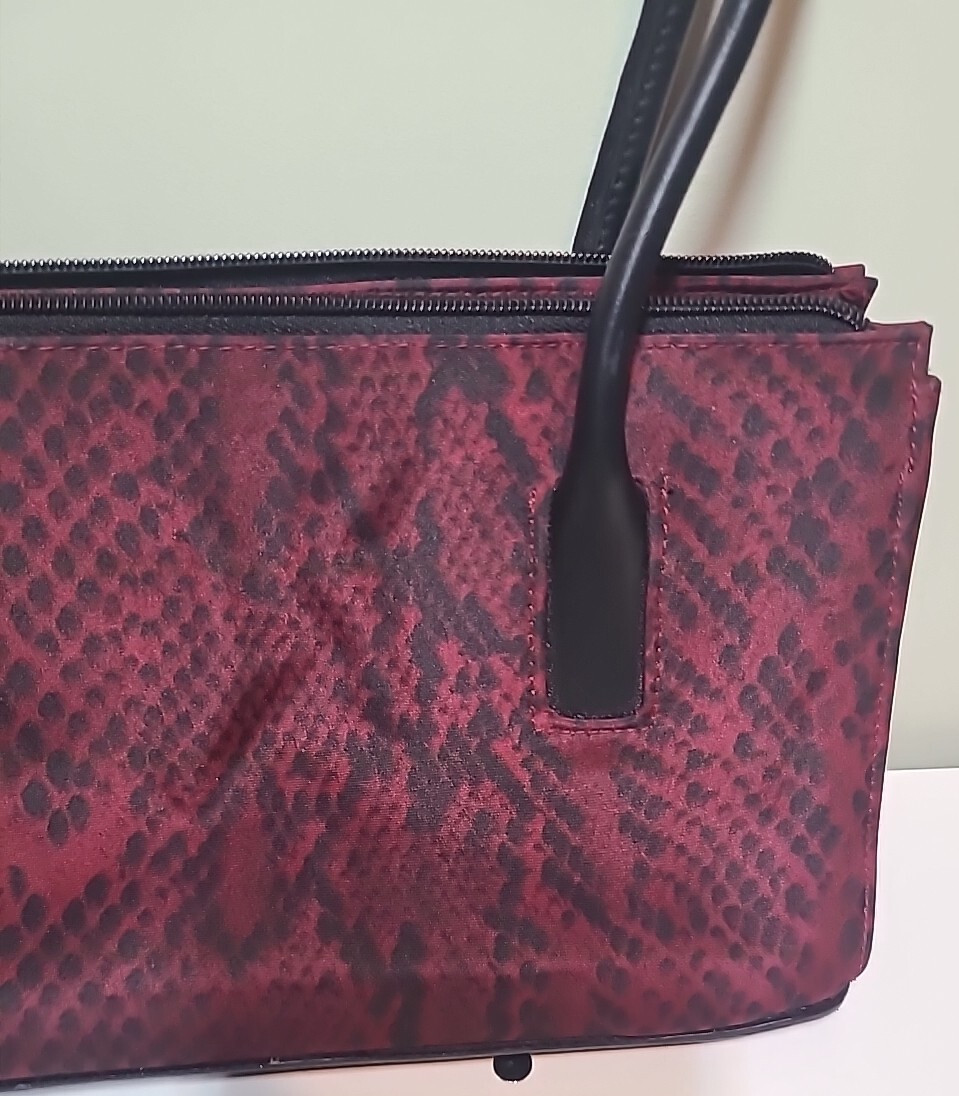Red Leopard like Print Purse with stiff black handles Polyester w/ Vinyl Trim