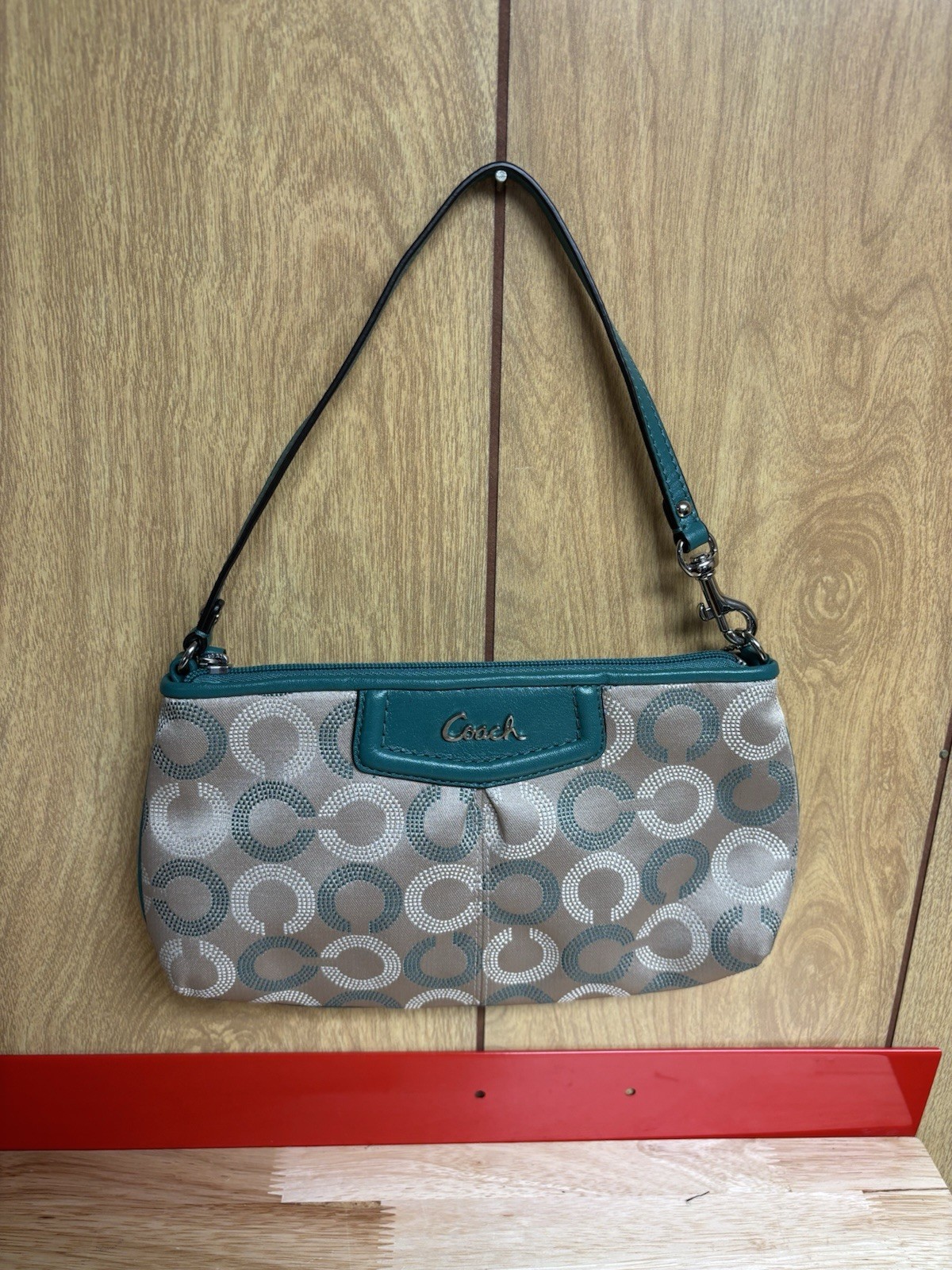 Coach Ashley Dotted OP Art print wristlet in khaki and Aegean green