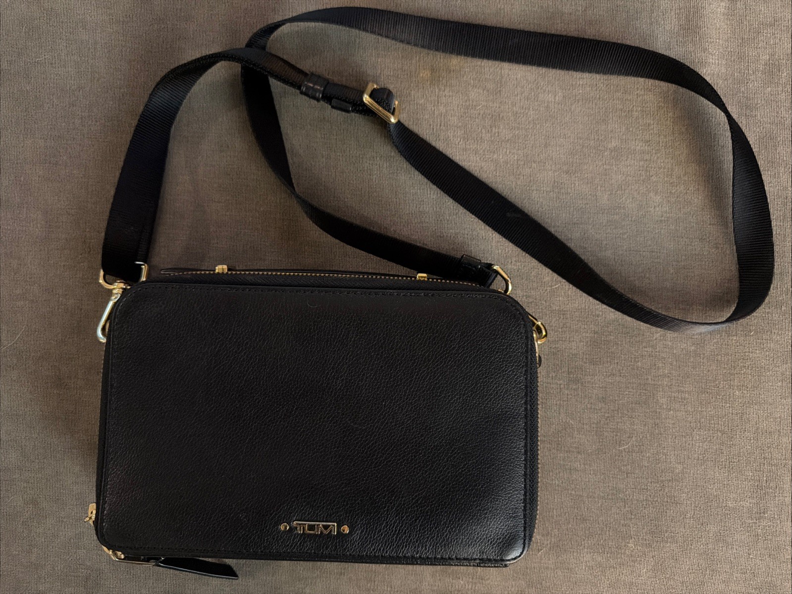 TUMI Black Solid Crossbody Bag Zip Closure Gold Hardware Detachable Strap