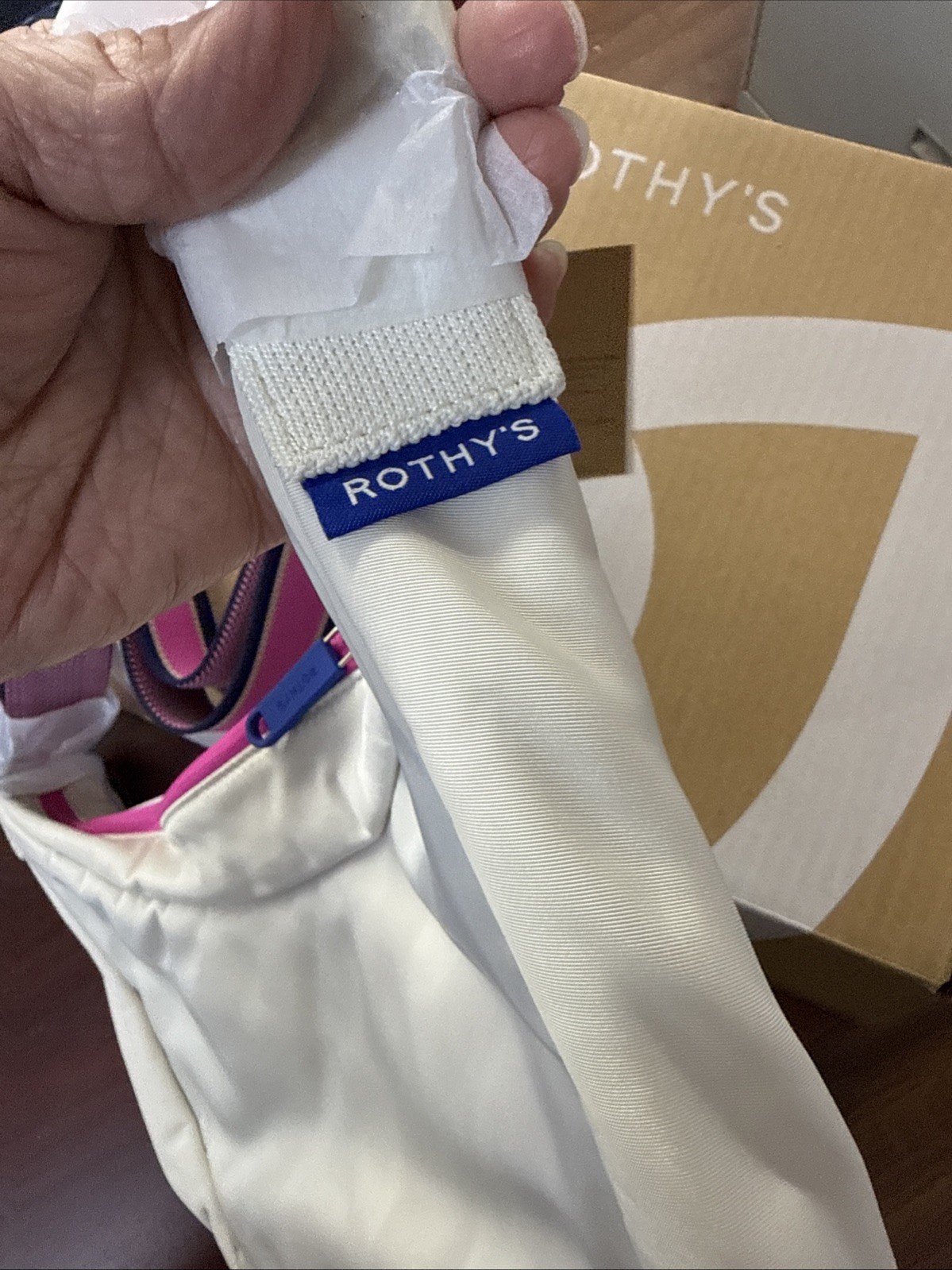 Rothy’s The Travel Sling Gold Stripe Bag In Optic