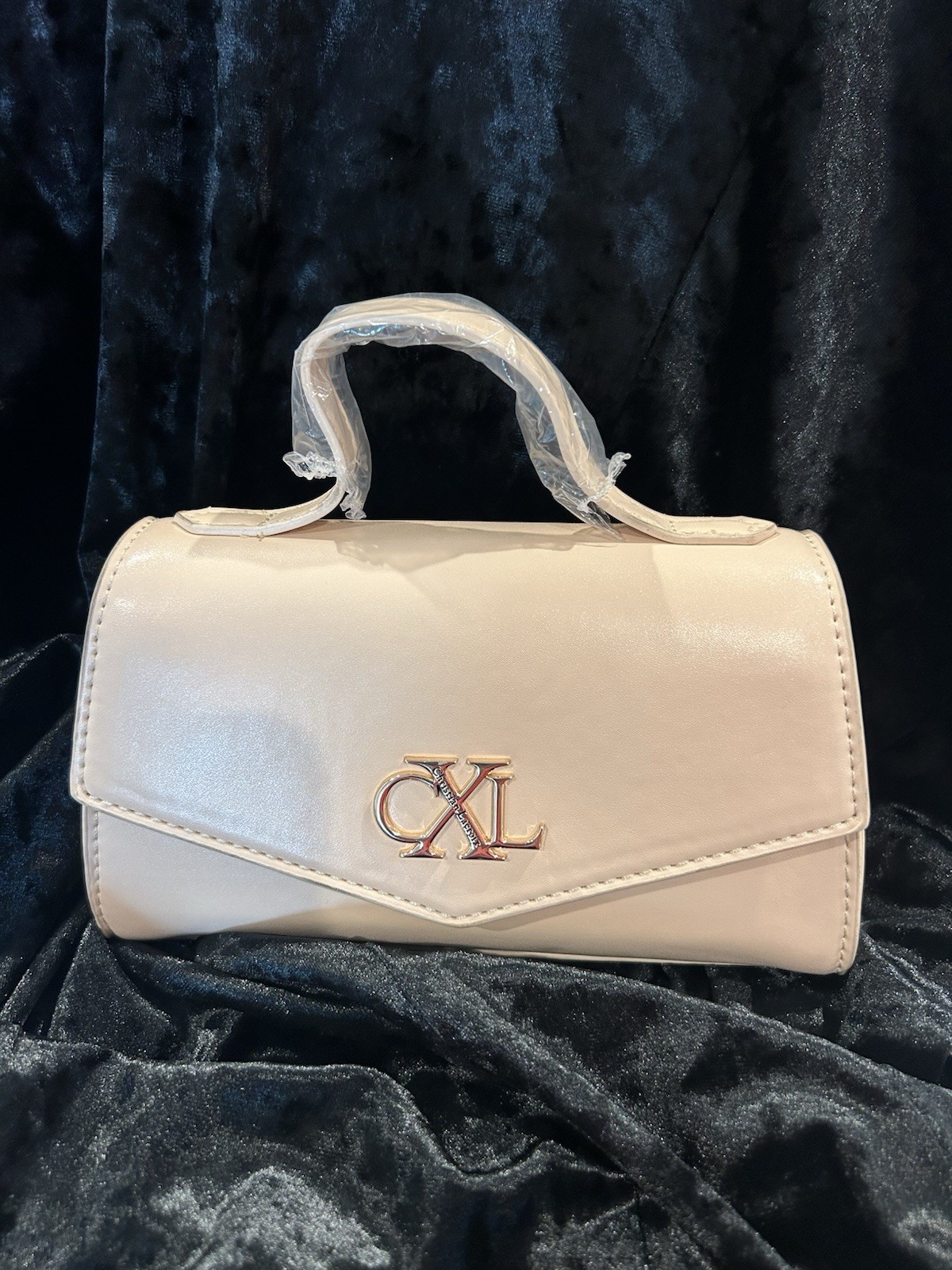 CXL Christian Lacroix Laine Matte Patent Top Handle Crossbody Panna Cotta Beige