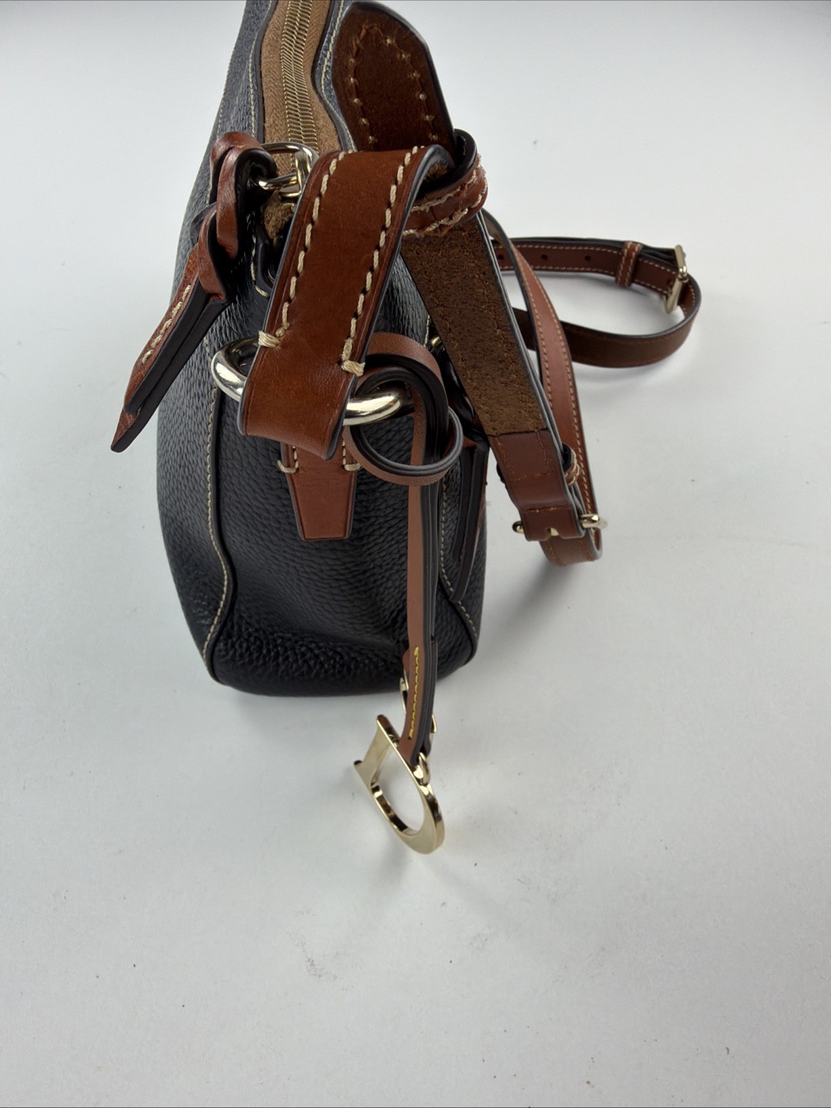 Dooney & Bourke Black Pebble Leather Crossbody Bag with Brown Trim
